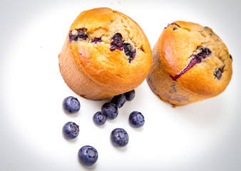Blueberry muffins on white background