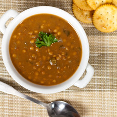 Lentil soup with saltine crackers