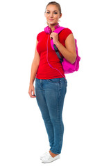 Pretty college student carrying pink backpack