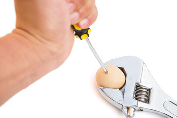 egg and wrench and screwdriver with clipping path