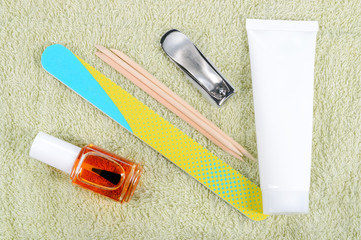 Manicure set on towel.