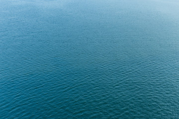 Fototapeta na wymiar Rippling blue water surface