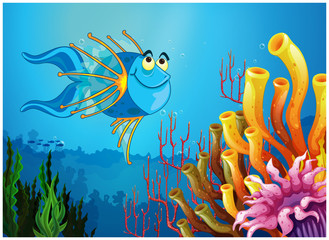 Fototapeta na wymiar A blue fish under the sea near the coral reefs