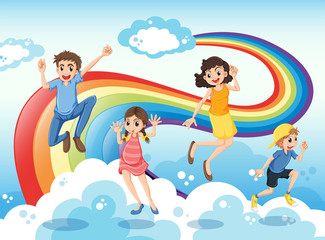 Obraz na płótnie Canvas A happy family near the rainbow