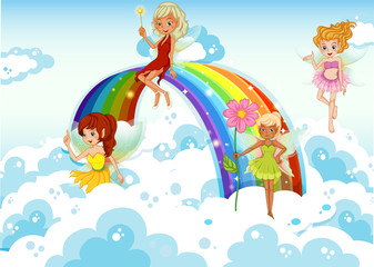 Fototapeta na wymiar Fairies above the sky near the rainbow