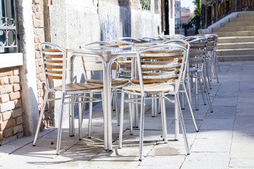 Empty tables of sidewalk cafe