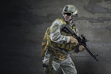 Soldier with rifle and mask