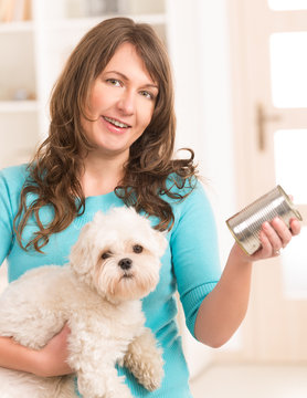 Woman Feeding Her Dog