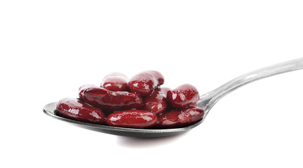 Preserve beans on a spoon.