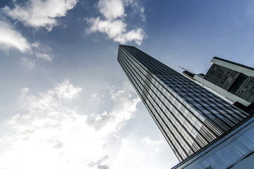 Fototapeta na wymiar Skyscraper under a blue sky.