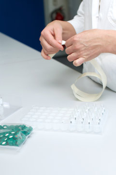 Picture of a person working in a lab