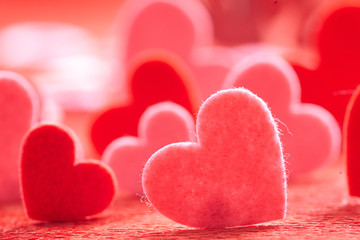 Fototapeta premium Hearts on red background