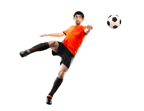 football player striking the ball, isolated