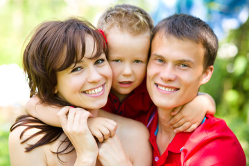 Fototapeta premium Young cheerful family