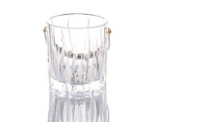 Crystal made ice bucket over white background