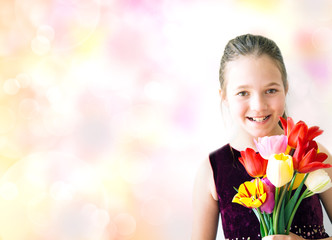Obraz na płótnie Canvas Bambina con i tulipani