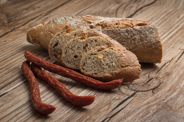 Dry smoked pork sausage with bread