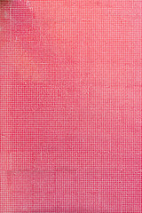 Wall with very small red tiles