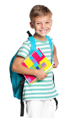 Little boy with exercise books