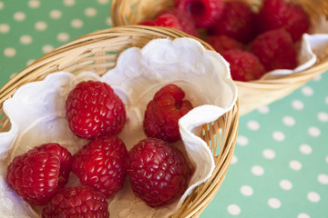 Raspberries in small baskets