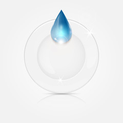 Fototapeta premium white plate and blue drop.dishwashing liquid on a background dis