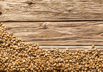 Coffee bean border on weathered wood