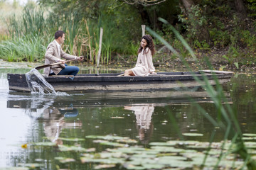 Loving couple in the boat