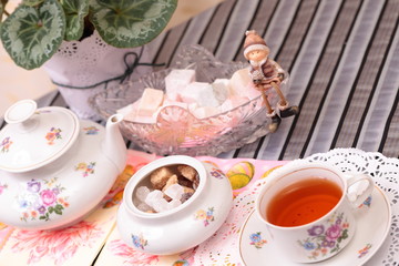 Warm cup of tea and sweets