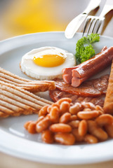 English Breakfast - sunny-side-up fried eggs, sausages