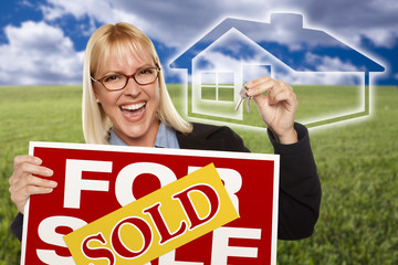 Woman with Sold For Sale Sign, Keys and Ghosted House