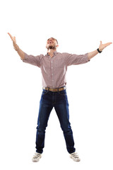 happy young man celebrating success on white background