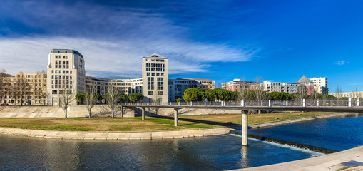 Modern buildings in Montpellier by river Lez - France - obrazy, fototapety, plakaty
