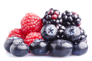 Mix berry in closeup, isolated on white background