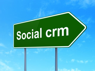Business concept: Social CRM on road sign background