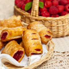 Raspberry filled pastries with sugar sprinkles