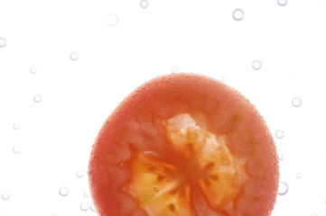 Tomato slice in water