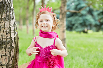 Half-length portrait of smiling little girl