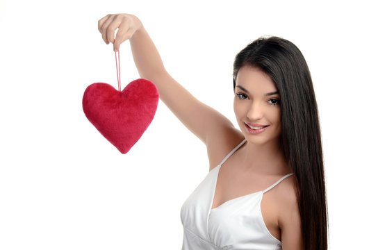  Girl holding a red heart.Valentine day.Focus heart,blur model.
