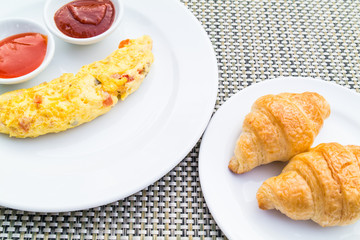 Omelet and croissants