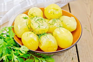 Potato boiled with parsley on the board