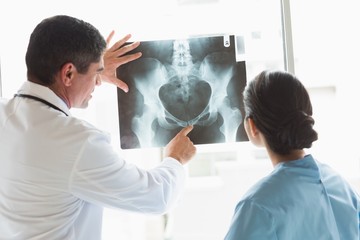 Medical team examining x-ray