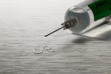 drops of drug down the needle