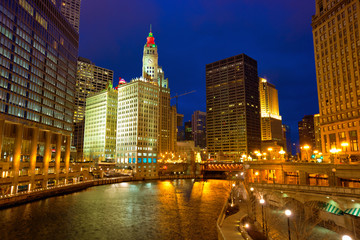 Fototapeta na wymiar Chicago River Walk with lights at dusk, IL, USA