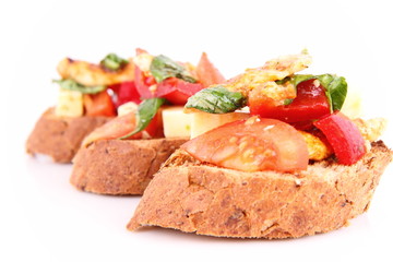 Sandwiches with chicken, tomato, cheese and bell pepper
