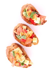 Sandwiches with chicken, tomato, cheese and bell pepper