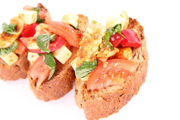 Sandwiches with chicken, tomato, cheese and bell pepper