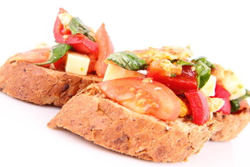 Sandwiches with chicken, tomato, cheese and bell pepper