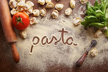 Foto op Plexiglas Pasta word written on table © raimunda-losantos