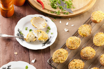 Baked eggs, stuffed with ham and parsley