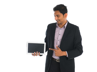 indian business male with tablet